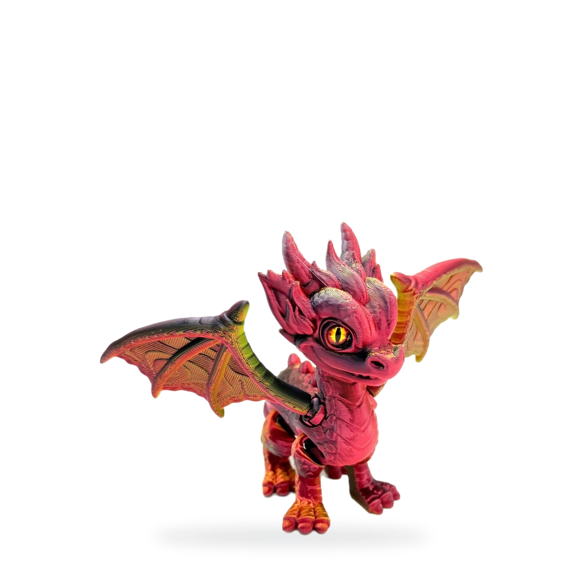 Red and gold posable baby dragon figurine with wings spread, studio card image