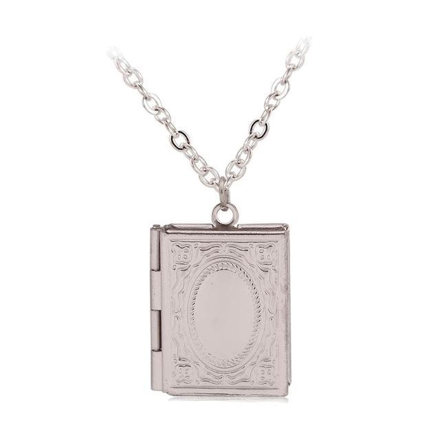 The Storykeeper book locket necklace in silver finish with chain