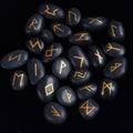 The Casting Stones Elder Futhark rune set on black stones