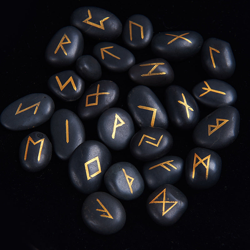 The Casting Stones Elder Futhark rune set on black stones