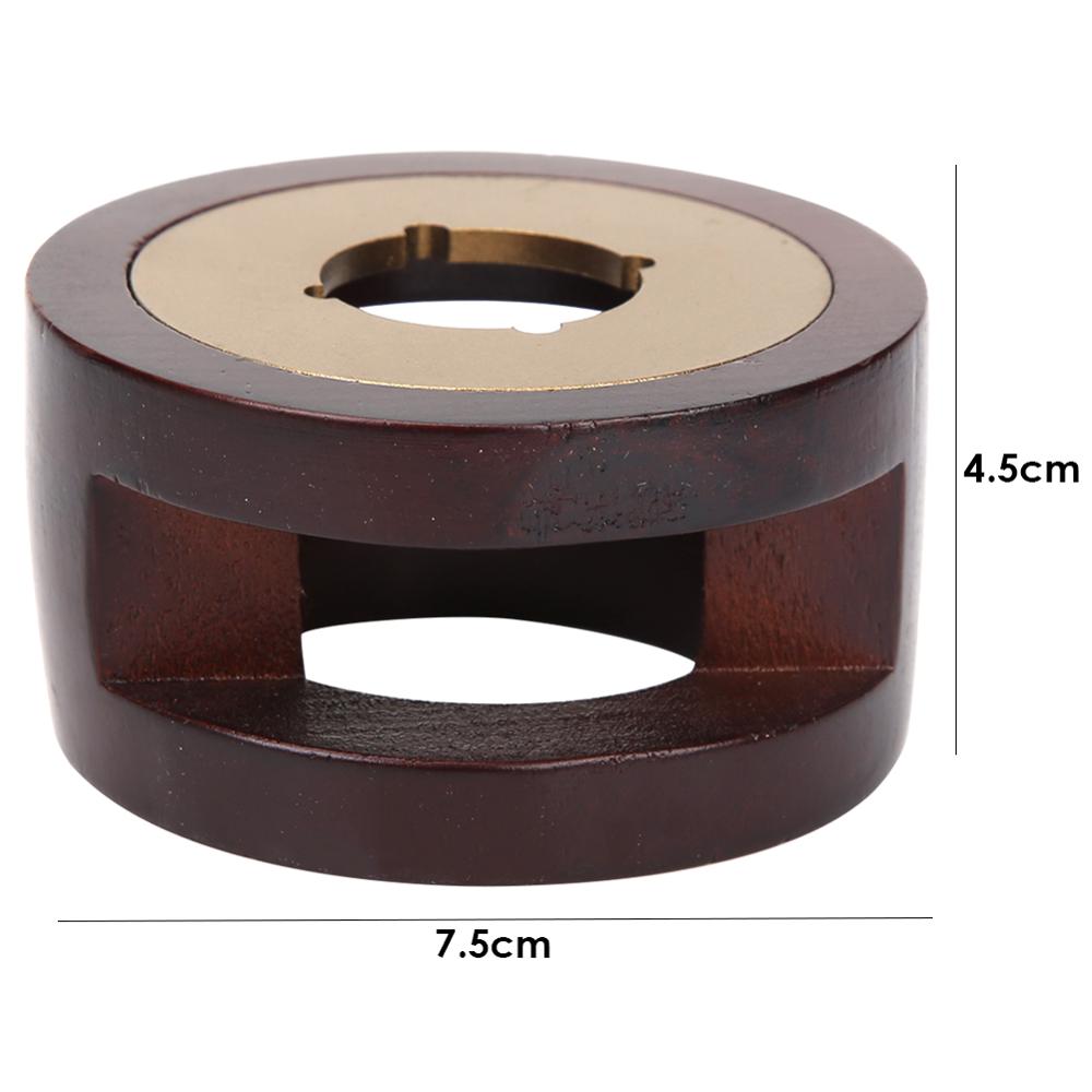 The Waxwarden furnace shown from an angle with dimensions, 7.5cm diameter x 4.5cm height