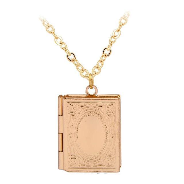 The Storykeeper book locket necklace in gold finish with chain