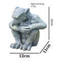 Side view of Vorreth cast resin gargoyle statue showing hand-finished stone texture