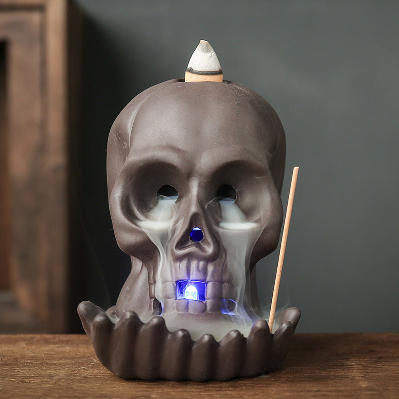Emberskull burner detail of carved skull