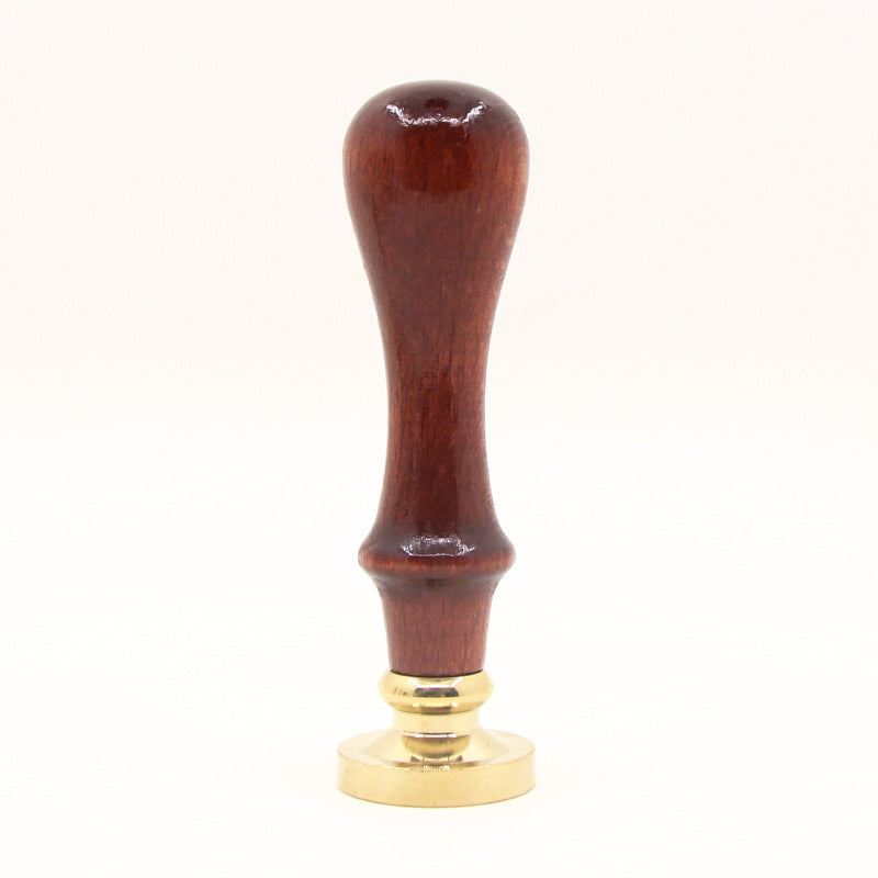 Beech wood handle of the wax seal stamp shown upright