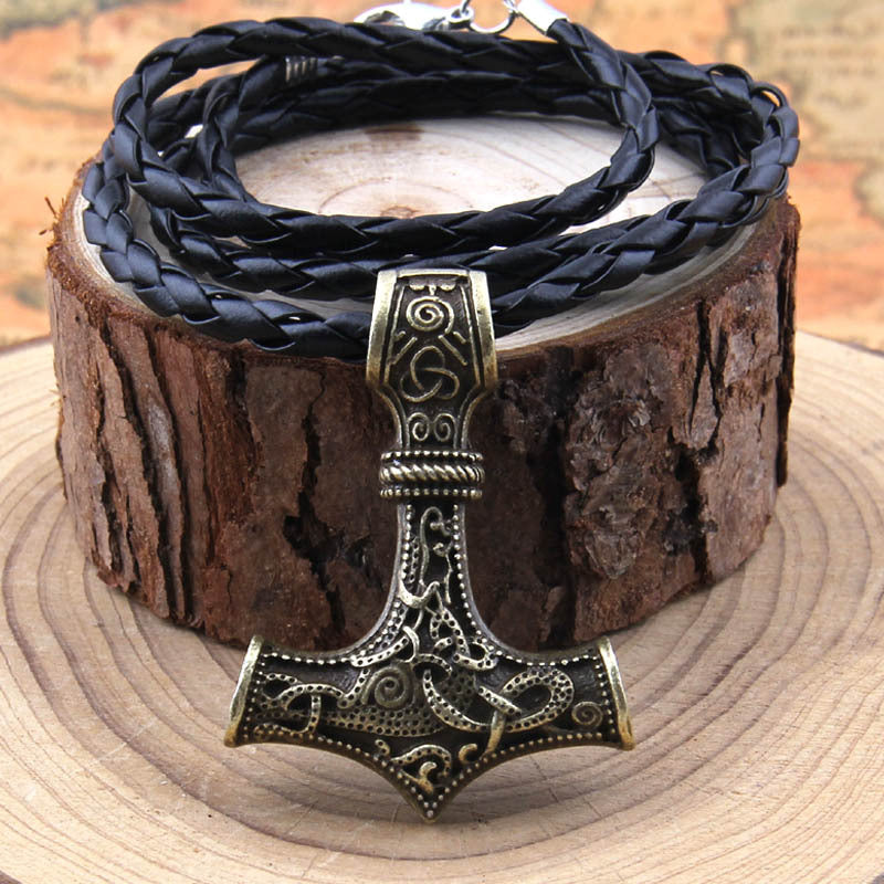 Mjolnir's Oath Thor's hammer pendant on braided leather cord