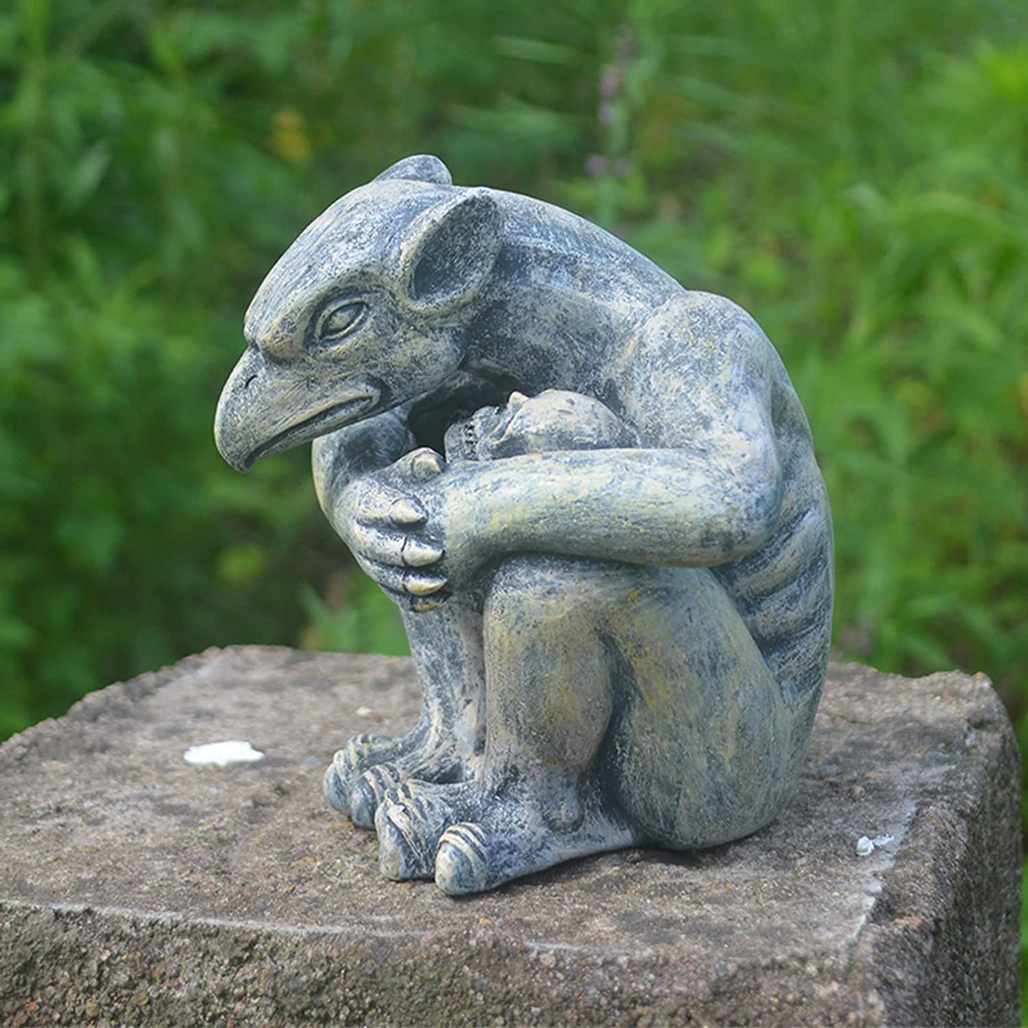 Close-up of Vorreth gargoyle statue claws and gothic cathedral stone detailing