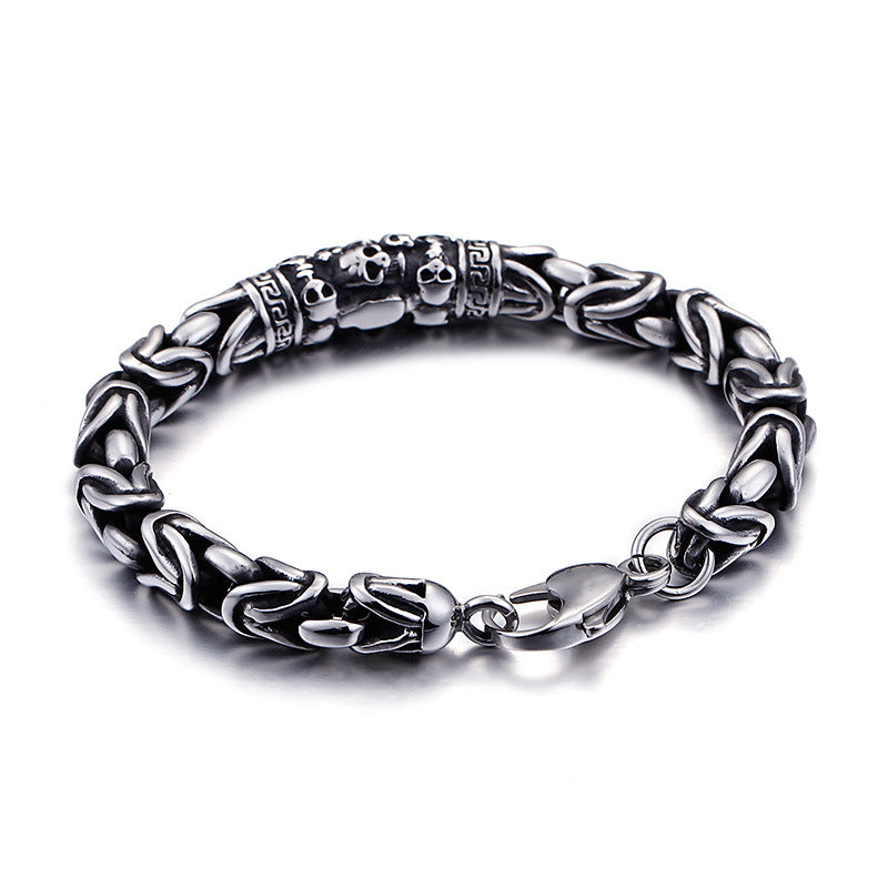 Skeleton chain bracelet laid flat showing the full link pattern and clasp
