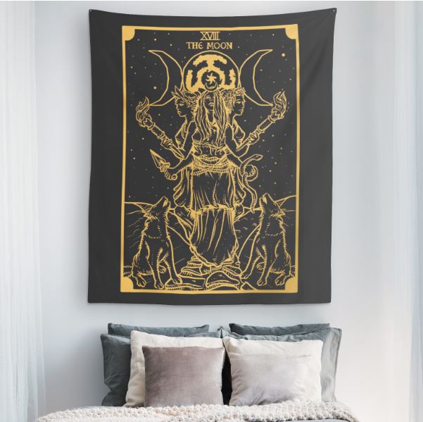 Hecate tapestry hung above a bed in a styled bedroom