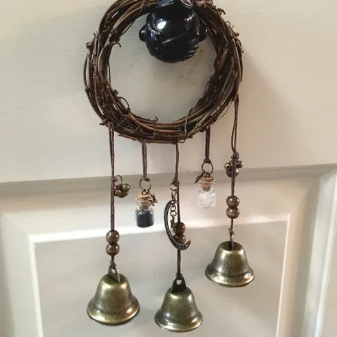 The Warding Chime witch's door bell detail view