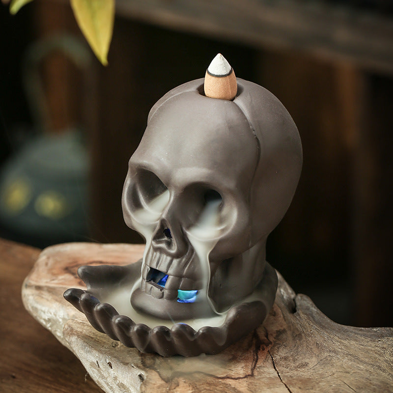 Emberskull ceramic skull backflow incense burner with cascading smoke