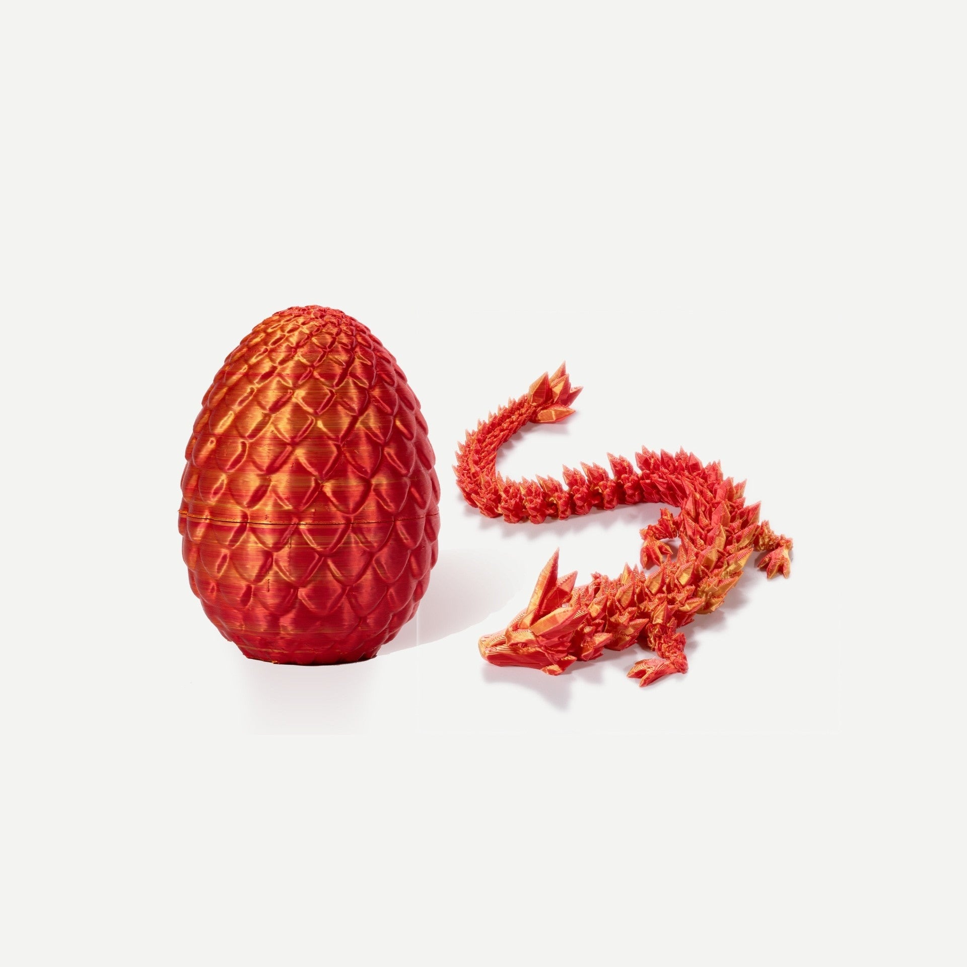 Laser red crystal resin dragon egg with matching articulated red gemstone dragon