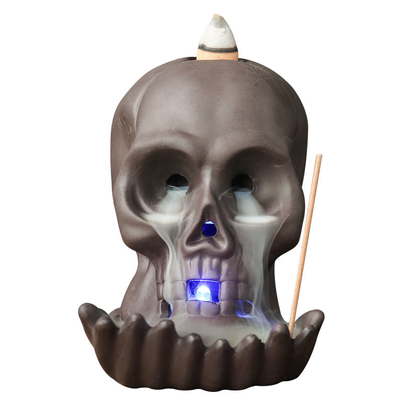 Ceramic purple clay skull incense burner front view