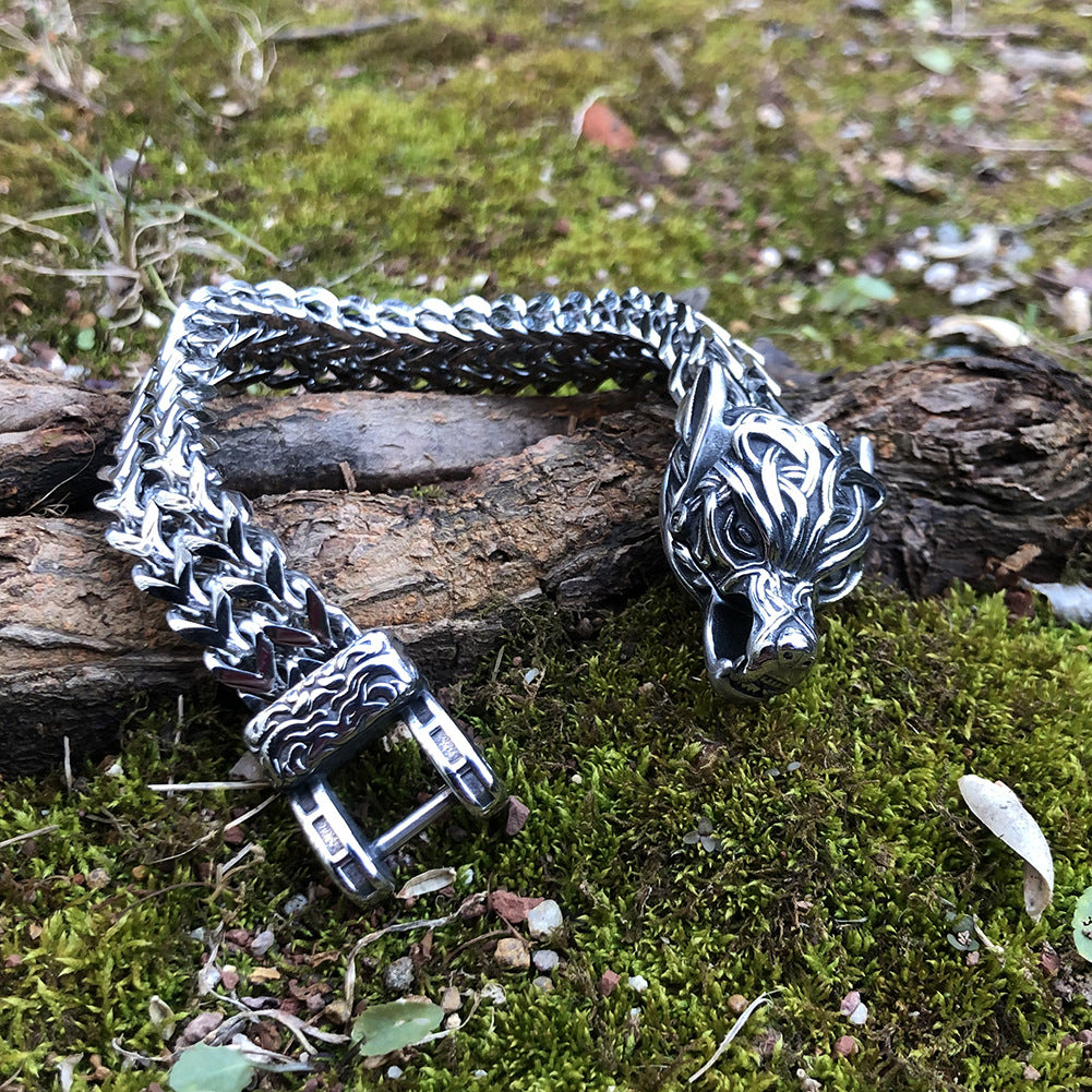 Close-up of Grimhelm Norse rune bracelet links showing deep-etched runic detailing