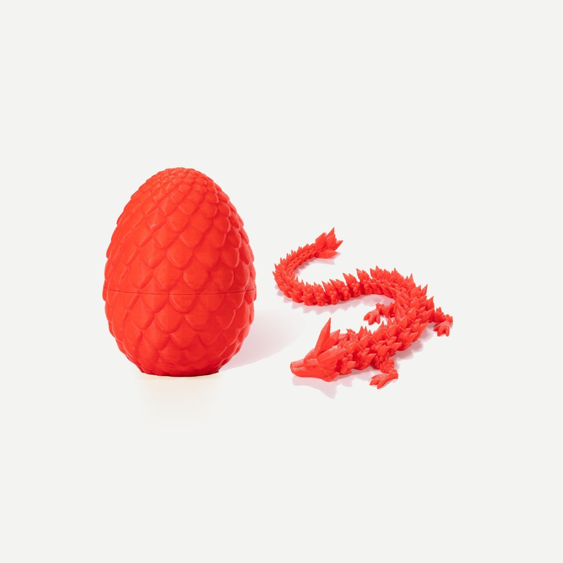 Red crystal resin dragon egg with matching articulated red gemstone dragon