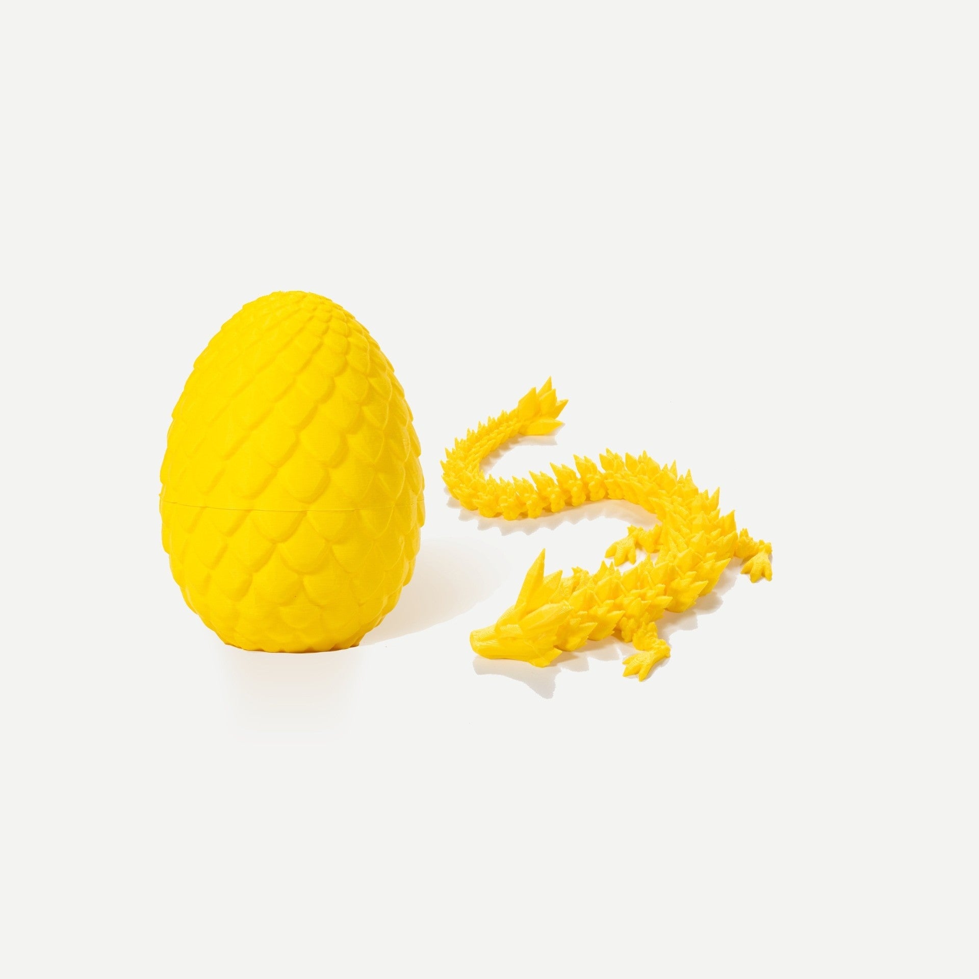 Yellow crystal resin dragon egg with matching articulated yellow gemstone dragon