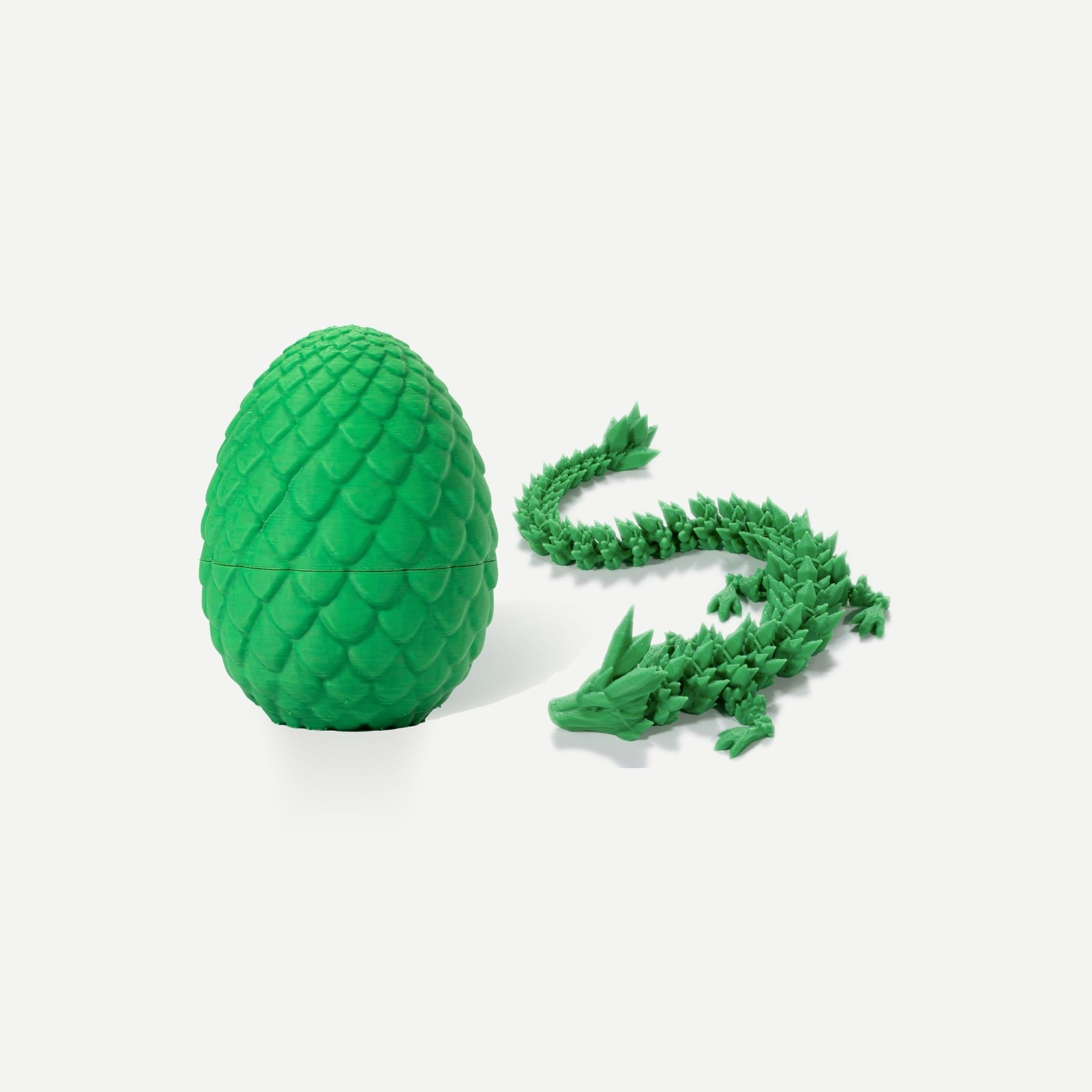 Green crystal resin dragon egg with matching articulated green gemstone dragon