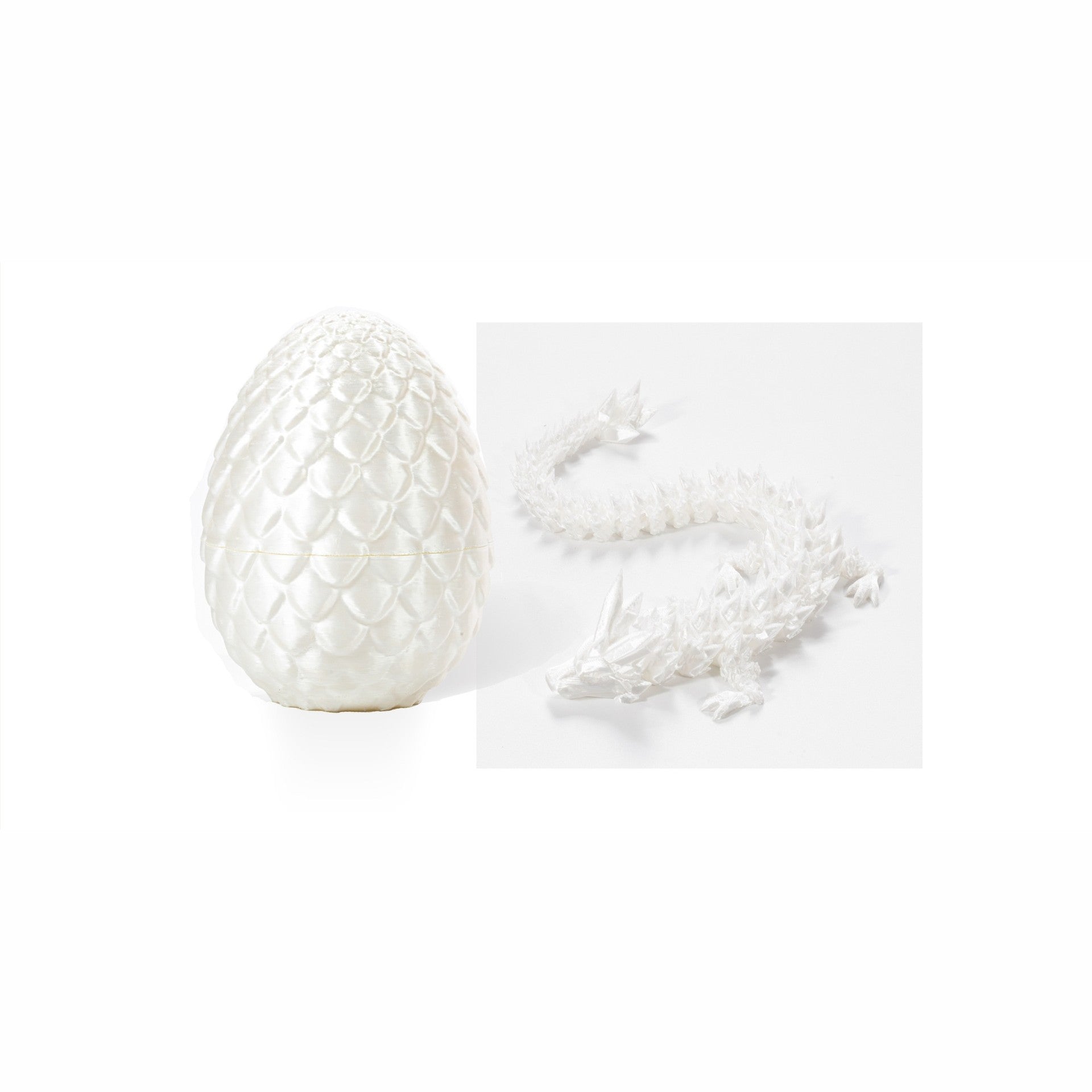 Silk white crystal resin dragon egg with matching articulated white dragon