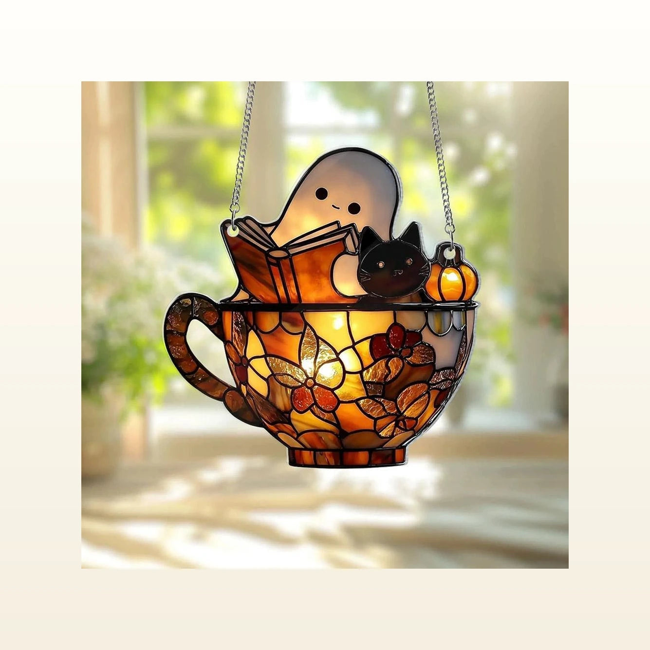 Round Bookshop Ghost stained-glass suncatcher of a little specter reading a book, backlit in a window