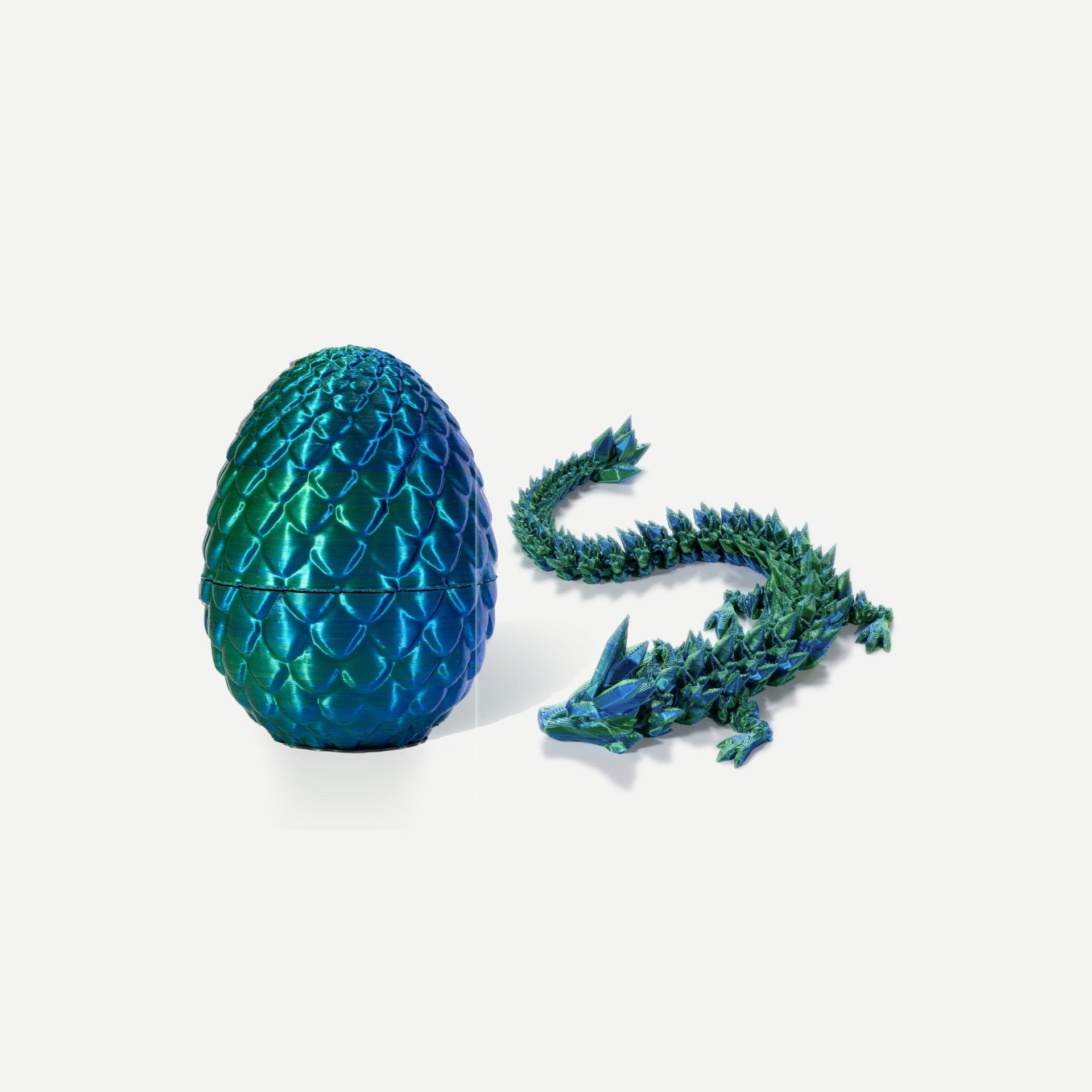Laser green crystal resin dragon egg with matching articulated green dragon